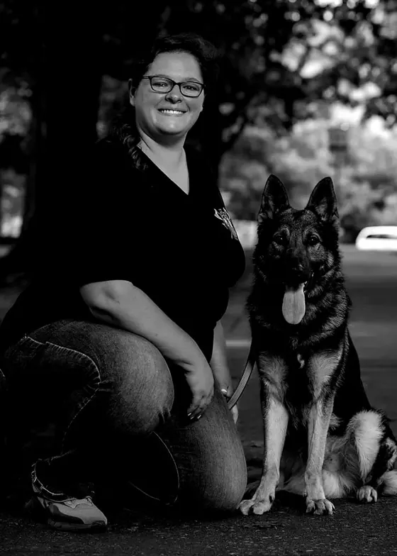 Emily Harris with a German Shepherd